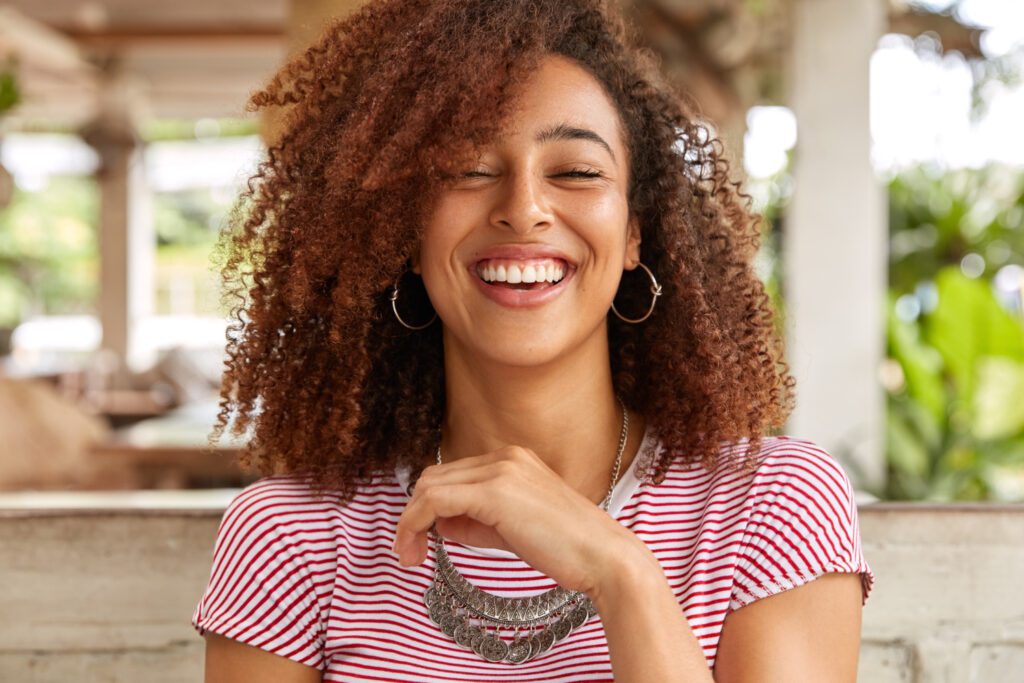 Cosmetic dentistry patient with a bright smile at Brownstown Dental Care in Woodhaven, MI